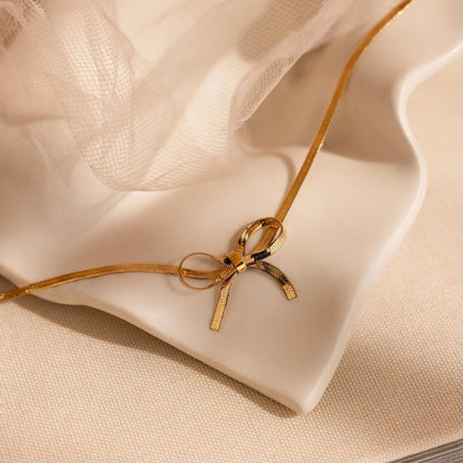 Golden Grace Bow Necklace – A Timeless Treasure