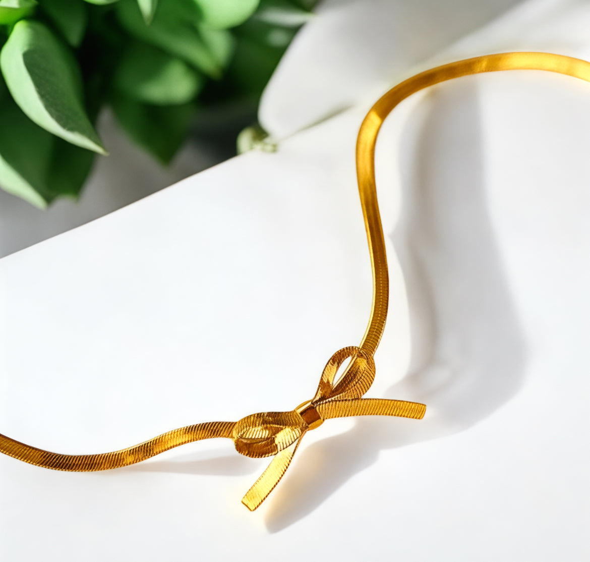 Golden Grace Bow Necklace – A Timeless Treasure