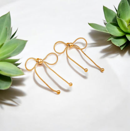 Golden Bow Elegance Earrings – A Timeless Treasure by Zenvy