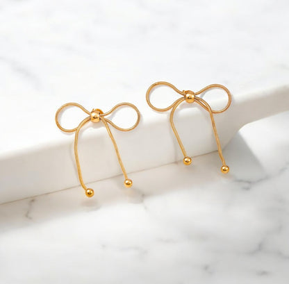 Golden Bow Elegance Earrings – A Timeless Treasure by Zenvy