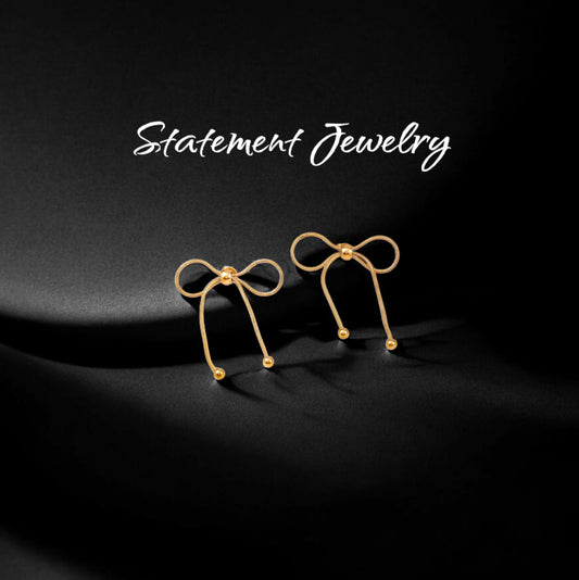 Golden Bow Elegance Earrings – A Timeless Treasure by Zenvy